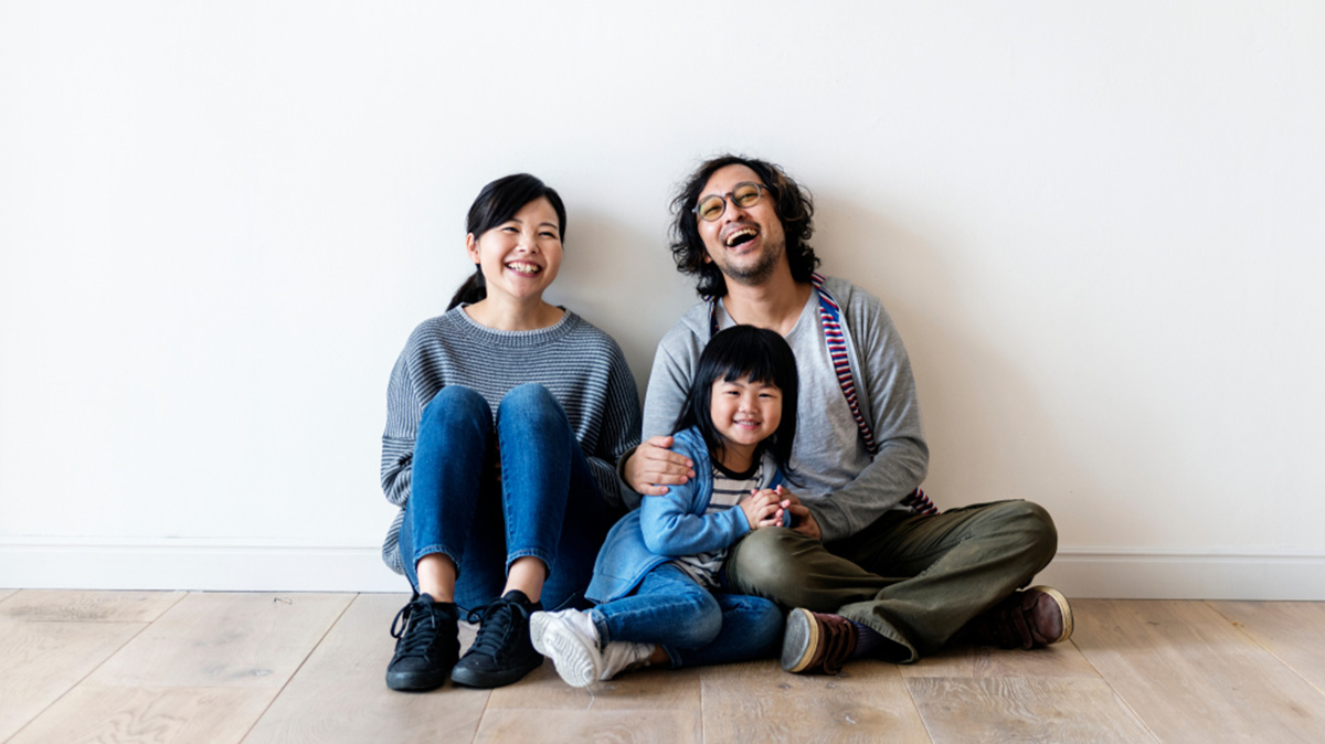 A Family Sit In A New Condo In Bang Na