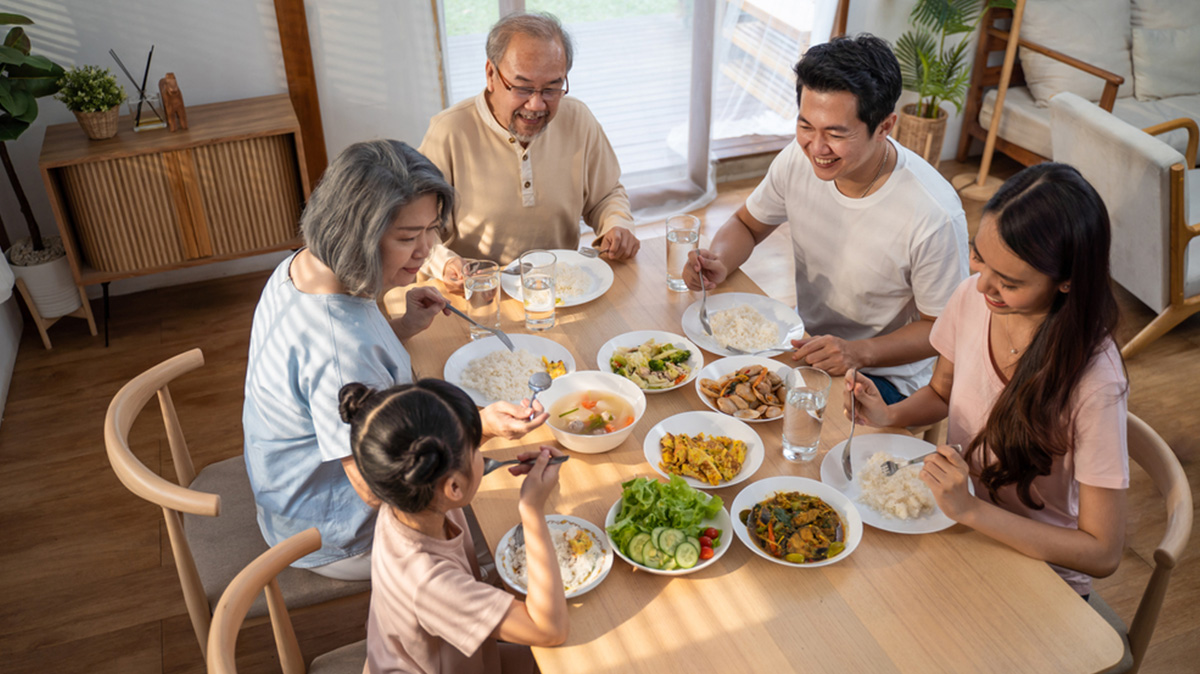 A Family Enjoying Dinner At Mulberry Grove House Project For Large Families