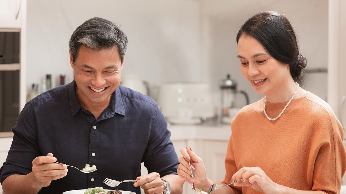 An Older Couple Enjoying A Healthy Meal Together